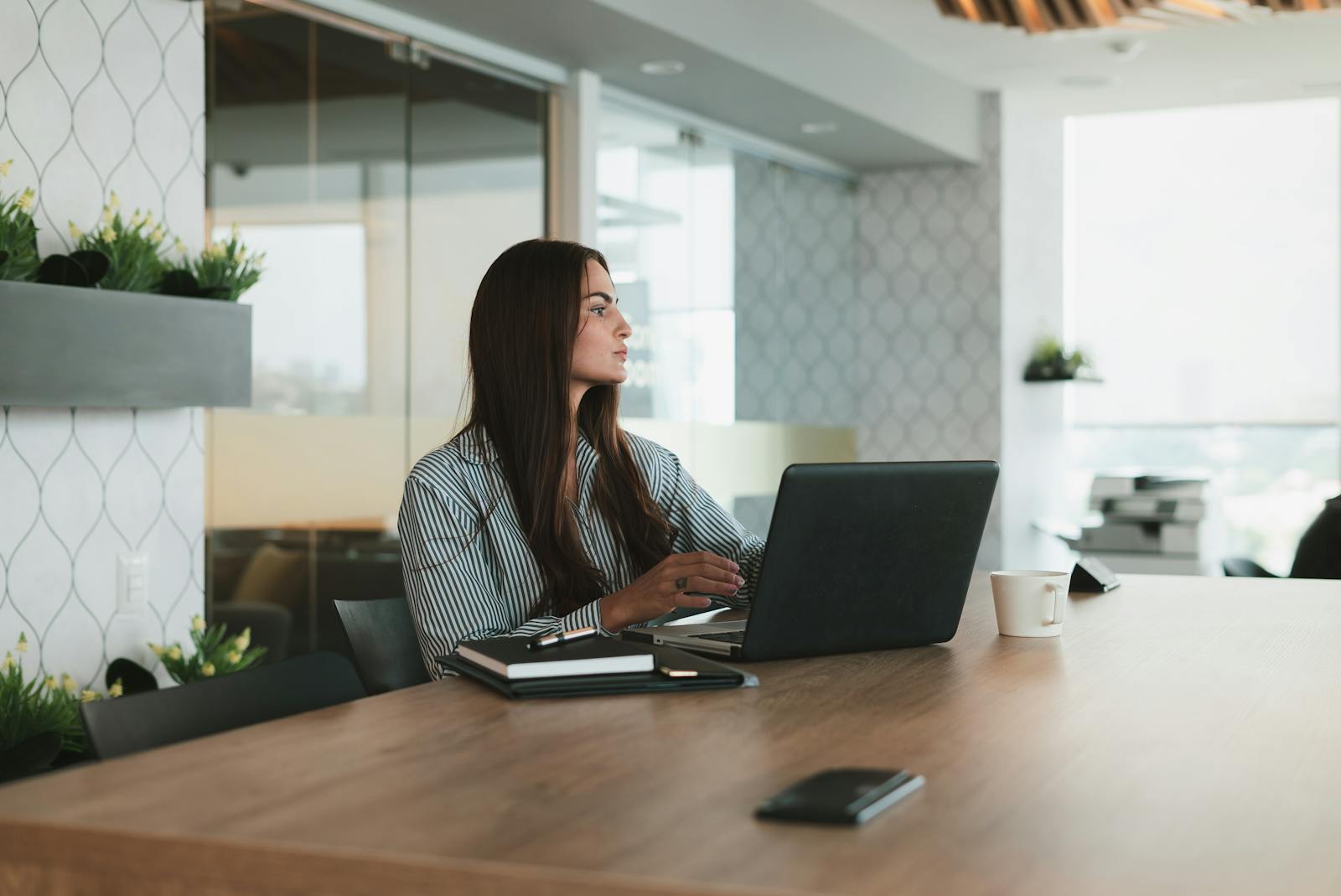 Businesswoman Working on Laptop